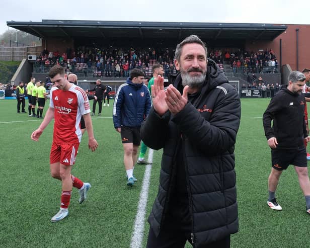 Jono Greening thanks the fans after the win against Darlington. Photo by Richard Ponter