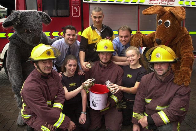 People are still ringing 999 asking for help from the fire service who are doing a wonderful job day in day out. Pictured in 2002 where the firefighters received a donation from Walkabout Bar