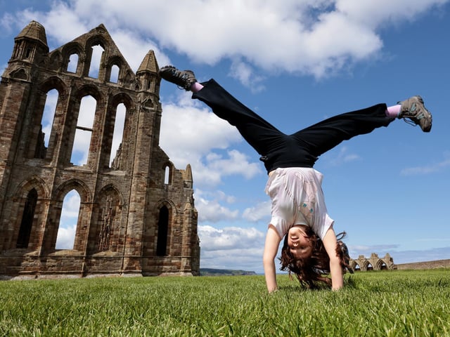 Acrobatic fun at the clifftop English Heritage site.picture: Richard Ponter