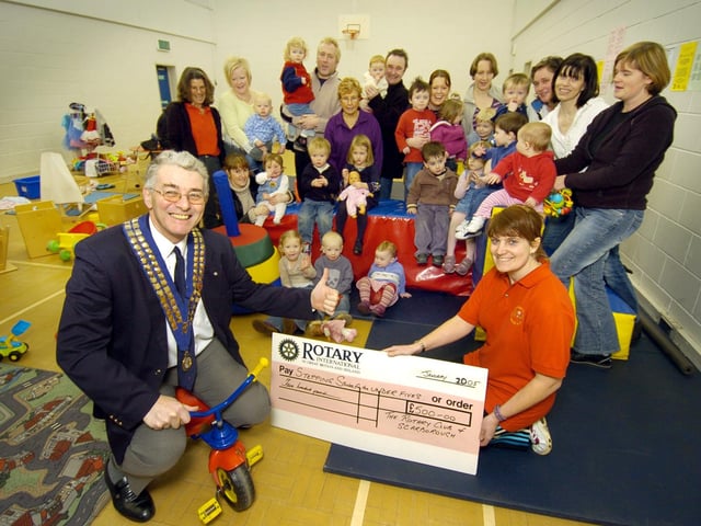 Scarborough Rotary Club presents £500 to the Stepping Stones Nursery, at Falsgrave and Gallows Close Community Centre, for new toys and games. Club president David Grisdale hands over a cheque to playleader Trudy Petrie.