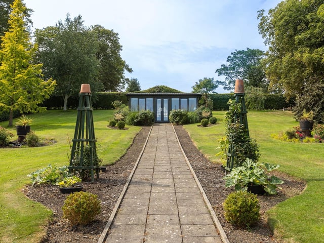 The garden room within the beautiful landscaped gardens.