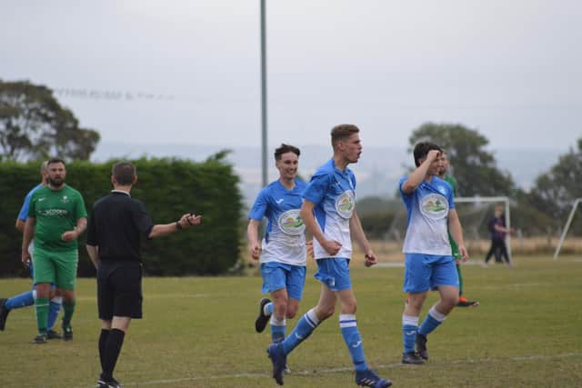 George Ridler celebrates putting his side 3-1 up in last Wednesday's Heslerton win over Slingsby. PHOTO BY CHERIE ALLARDICE