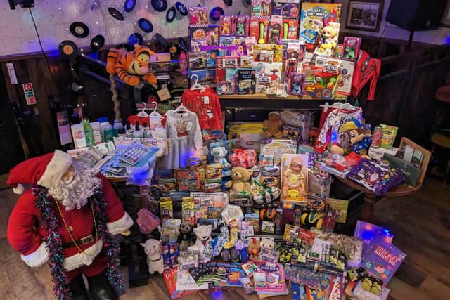 The fantastic collection for the women's refuge by the customers of the Whitby Way