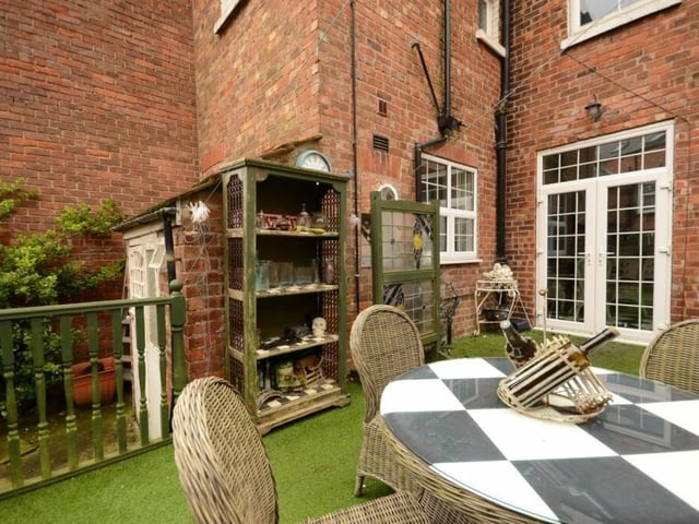 French doors open to the rear garden area from the dining room.