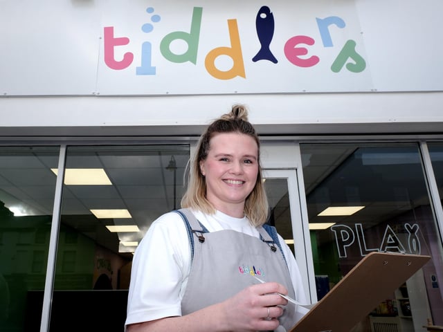 Owner Zoe White outside Tiddlers on Falsgrave.