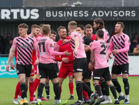 Tempers flare between the Boro and Curzon Ashton players during the game on Good Friday, which Ashton won 1-0. PHOTOS BY VIKING PHOTOGRAPHY YORK