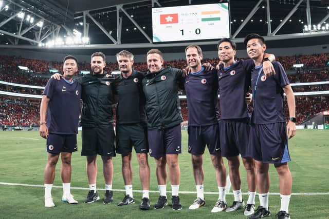 Scarborough's Darren Arnott, second from left, and the rest of the Hong Kong senior team after their 1-0 win against group favourites India in front of a crowd of almost 50,000.