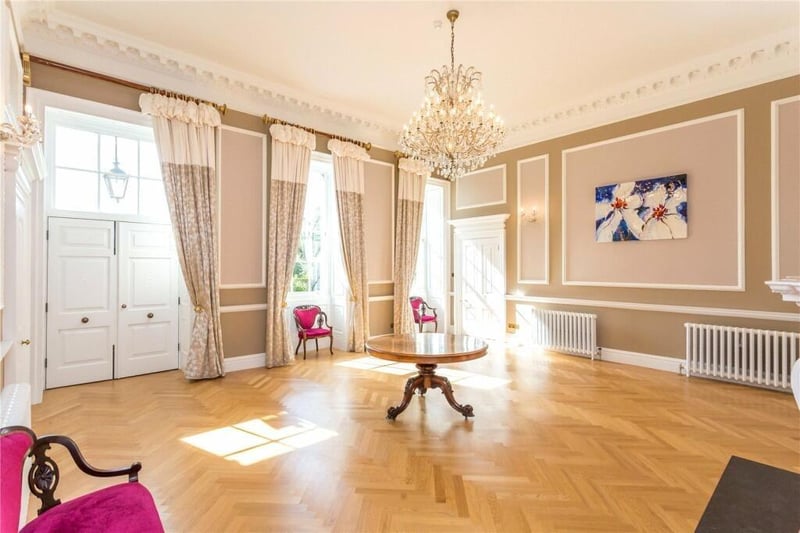 The very spacious and light entrance hall to the country house.