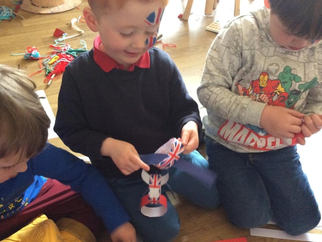 Children at Childhaven Nursery School made Union Flag decorations