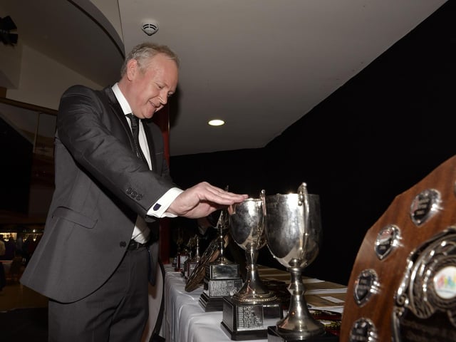 Organiser Matt Hewison prepares the awards
