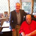 Dr Keith Souter with Sir Patrick Moore in his study.