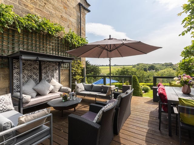 One of many outdoor seating areas that take advantage of the fine views.