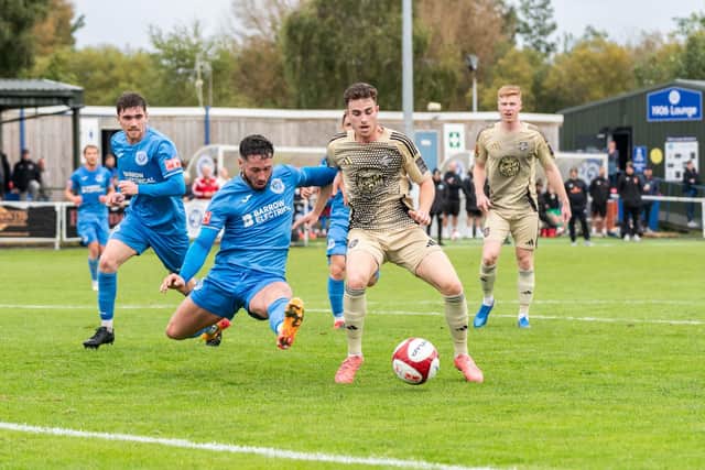 Dom Tear pushing on for Boro at Warrington Rylands in the FA Cup. Photo by Wandering Photography