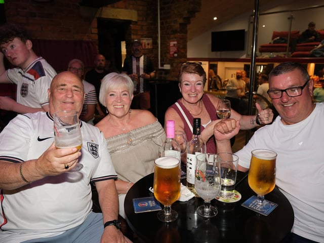 Fans enjoy the World Cup clash at The Sports Bar on Castle Road. photo: Richard Ponter