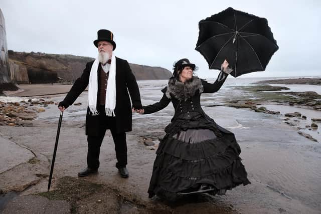 The Victorian Festival at Robin Hoods Bay - Michael Shelley and Michelle Hepworth brave the weather on the seafront in 2024