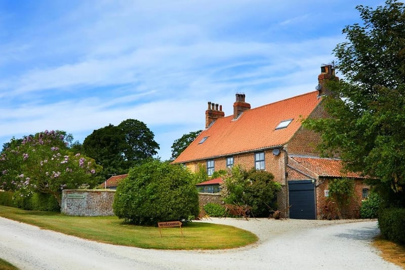 A period farmhouse with three bedrooms & two loft rooms, plus a three bed cottage and a range of holiday lets, set in approx. 3 acres, in a popular and accessible rural location, close to the coast. Currently listed for sale with Rural Scene at a guide price of £1,750,000.