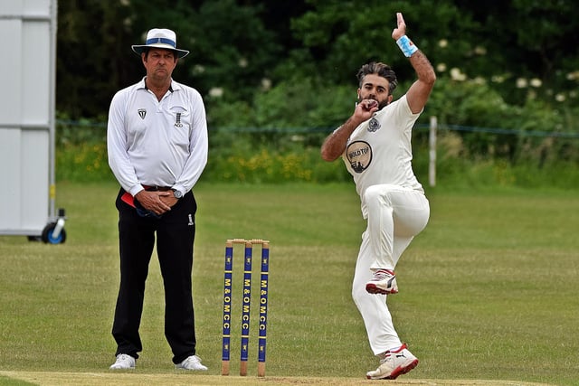 Scarborough's Muhammad Ayub takes the new ball.