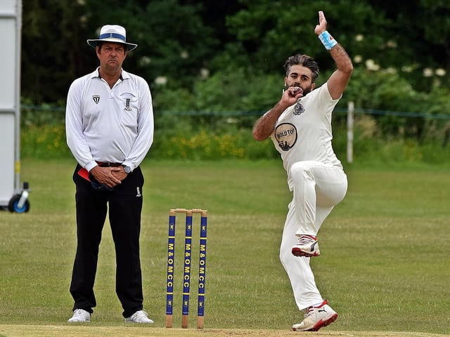 Scarborough's Muhammad Ayub takes the new ball.