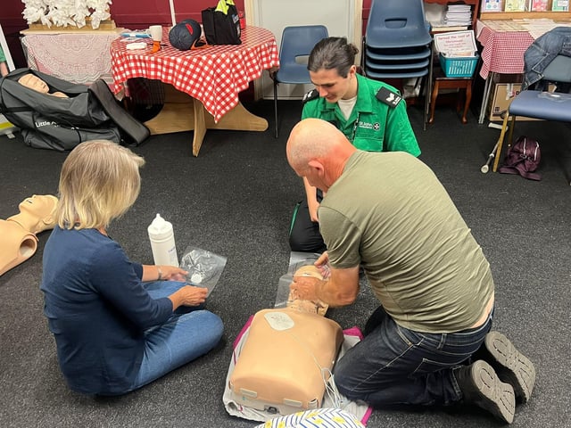 Learning about CPR and practicing their new skills