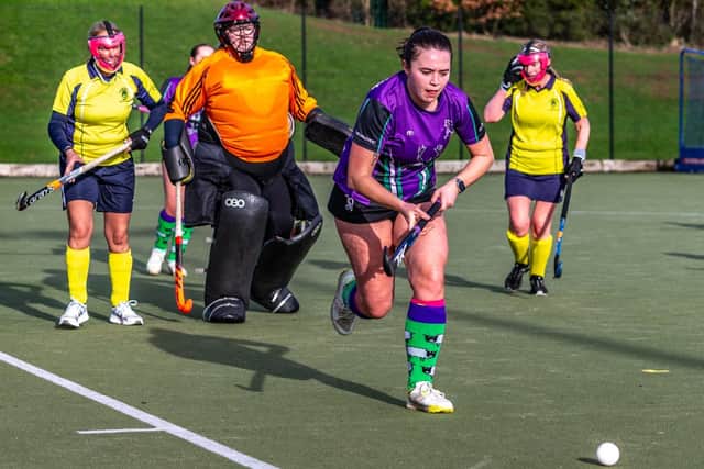 Bronwyn Hodgson chases after the ball. Photo by Brian Murfield