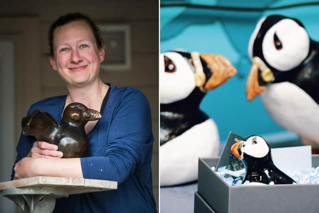 Sarah Brabbin, British Wildlife Sculptor, with her bronze Puffin, alongside the special Puffin themed exhibition at Bempton Cliffs.