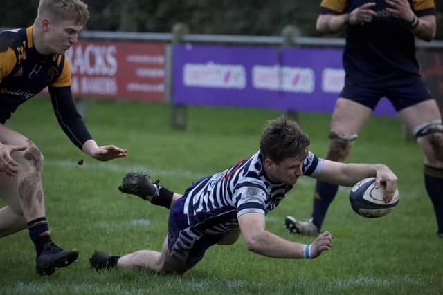Reece Dixon dives over for a Pocklington try. Photo by Becky Brett