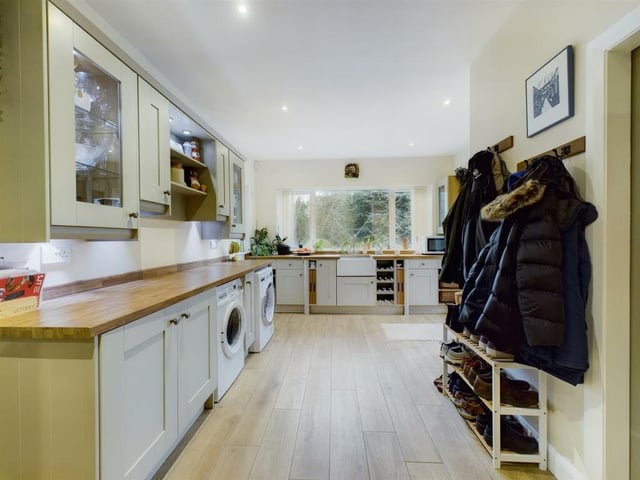 The expansive ground floor design allows for cloakroom space.