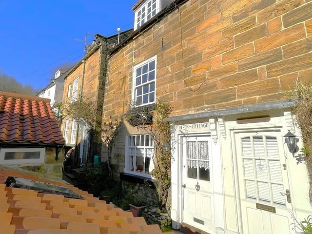 The approach to Olsen Cottage, in a prime position in the old fishing village.