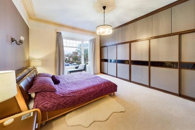 One of the property's four double bedrooms, with fitted wardrobes.