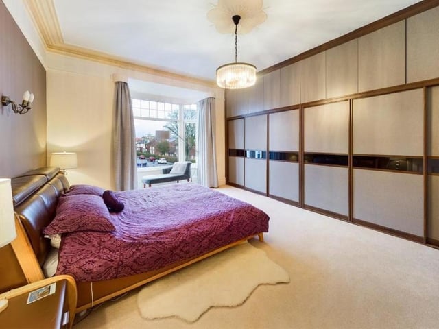 One of the property's four double bedrooms, with fitted wardrobes.