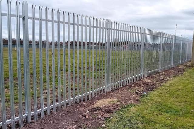 The council has replaced brick walls and thin metal sheeting around Dukes Park with a fence.