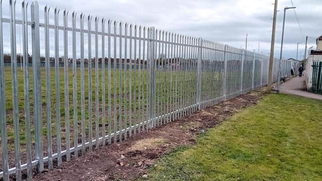 The council has replaced brick walls and thin metal sheeting around Dukes Park with a fence.
