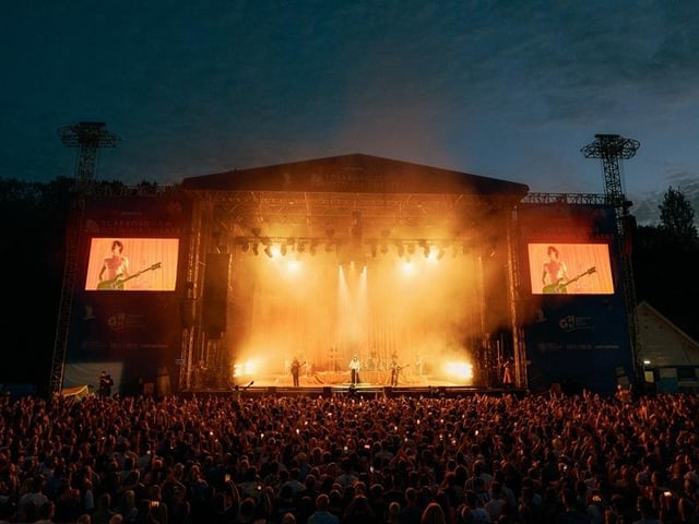 The stage lights up the arena. photo: Cuffe & Taylor