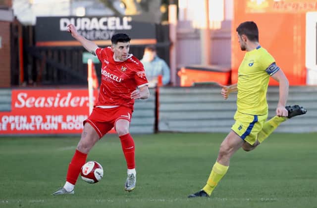 Michael Coulson in action for Brid Town