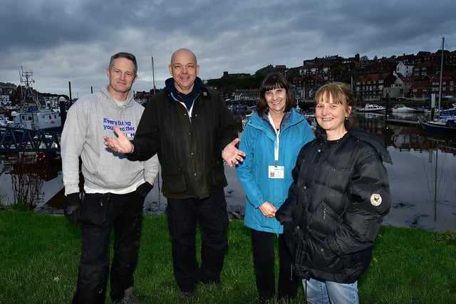 Setting up for Whitby's Christmas Festival... some of the organisers, Tim Cole, Michael King, Anne Cowey and Helen Berry.
picture: Richard Ponter