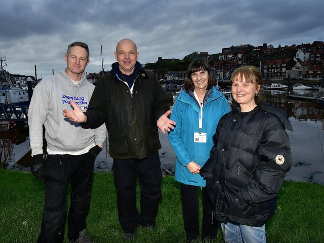 Setting up for Whitby's Christmas Festival... some of the organisers, Tim Cole, Michael King, Anne Cowey and Helen Berry.
picture: Richard Ponter