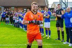 A guard of honour for Whitby Town goalkeeper before his Testimonial match against York City. PHOTOS BY BRIAN MURFIELD