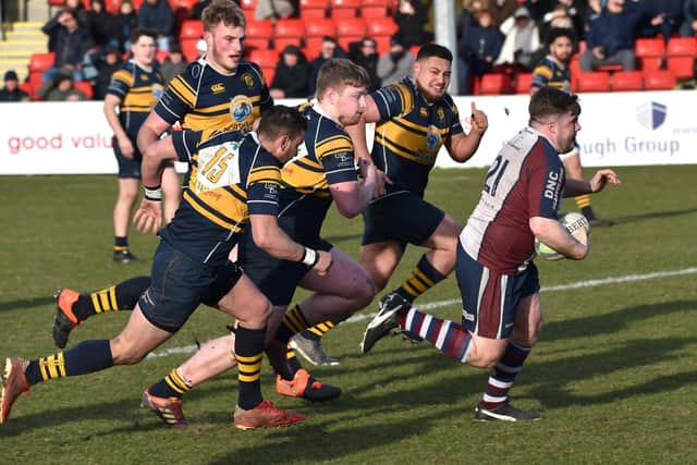 Hosts Scarborough RUFC race away from Bridlington RUFC.