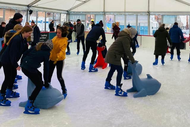 Fun at the Whitby ice rink on Endeavour Wharf.