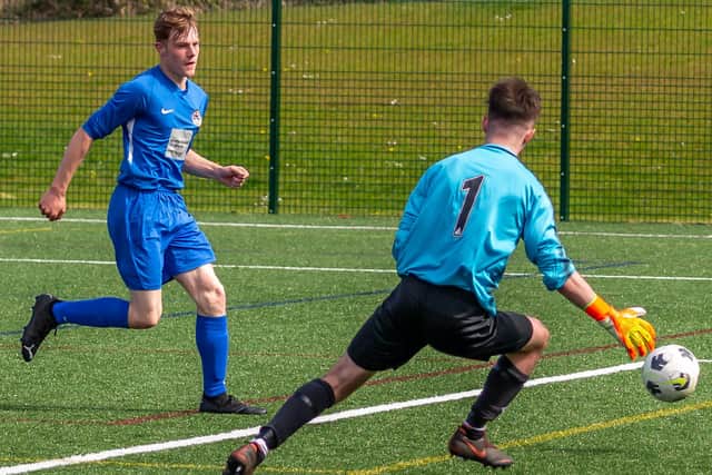 Kaleb Gravett scores Fishermen's opener in the 4-0 Scarborough FA District Cup semi win against Newlands PHOTOS BY BRIAN MURFIELD