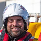 Picture is RNLI crew member Mike Patrick, who's children love to come down and watch the lifeboats. Credit: Mike Milner/RNLI