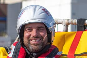 Picture is RNLI crew member Mike Patrick, who's children love to come down and watch the lifeboats. Credit: Mike Milner/RNLI