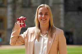 Hinderwell's Beth Mead poses after being made a Member of the Order of the British Empire (MBE) by the Prince of Wales, for services to football, during an investiture ceremony at Windsor Castle. 
Photo by Andrew Matthews - WPA Pool/Getty Images.