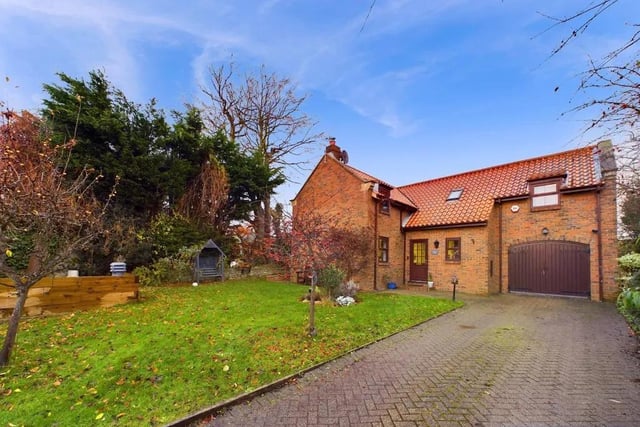 This four bedroom and two bathroom detached house is for sale with Hunters with a guide price of £475,000.