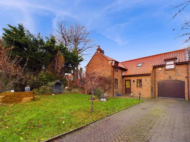 This four bedroom and two bathroom detached house is for sale with Hunters with a guide price of £475,000.
