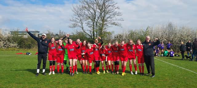 Scarborough Ladies Under-16s celebrate clinching the City of York Girls Football League title.