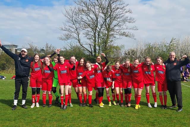 Scarborough Ladies Under-16s celebrate clinching the City of York Girls Football League title.