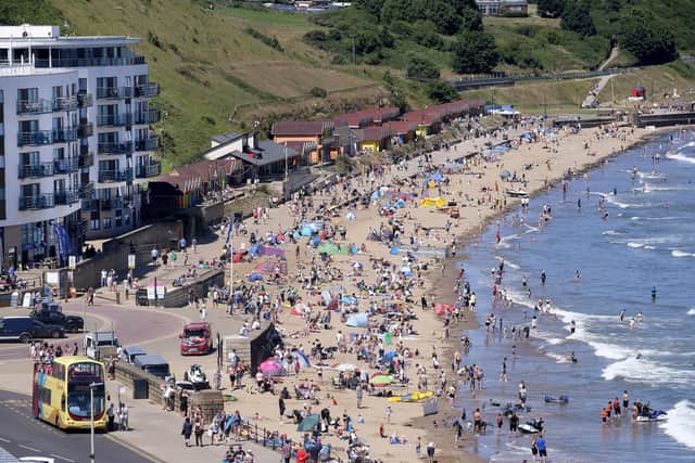 The four beachgoers were rescued by RNLI lifeguards, who had help from a nearby surf instructor.