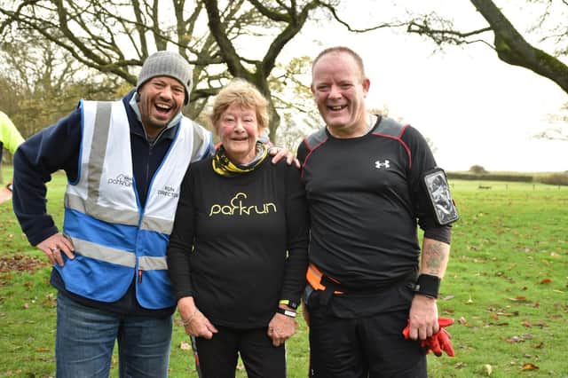 All smiles at the Sewerby Parkrun are, from left, helper ???,  with Bridlington Road Road Runners duo Linda Hall and Dave Pring PHOTOS BY TCF PHOTOGRAPHY