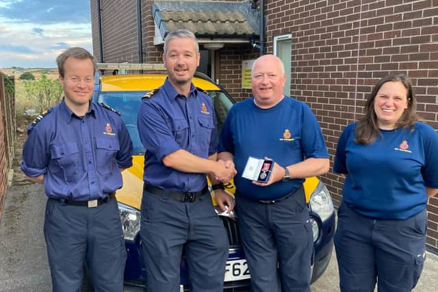 Mr Brighton was presented with his award by Senior Coastal Operations Officer Steve Hart